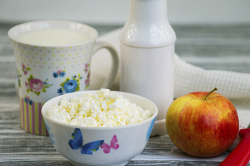 cottage cheese in a bowl on a wooden table