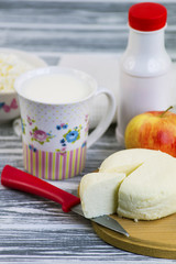 cheese in a bowl on a wooden table