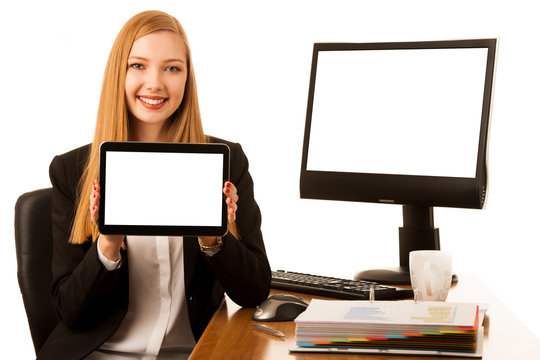 Beautiful young business woman surf internet on tablet in office