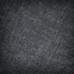 Fototapeta na wymiar Dark grey black slate stone abstract background or texture