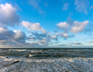 Sea coast. Waves and storms at sea. Waves on the Baltic Sea.