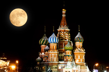 Fototapeta na wymiar St Basils Cathedral at night and full Moon. Winter season. Moscow, Russia
