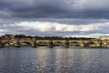 Fototapeta na wymiar Charles Bridge with the Vltava river in Prague