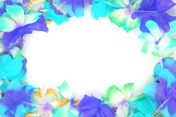 Fototapeta na wymiar color plastic hawaii flowers background