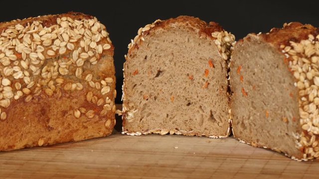 German bread: spelt bread with carrots on turntable 4k 11917
