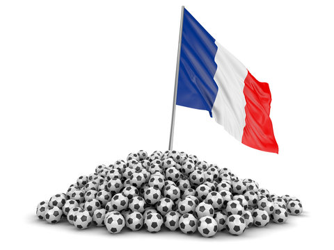 Pile of Soccer footballs and French flag. Image with clipping path