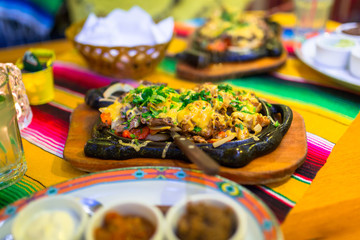 Steamy hot mexican beef and chicken fajitas
