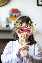portrait of a child with carnival mask