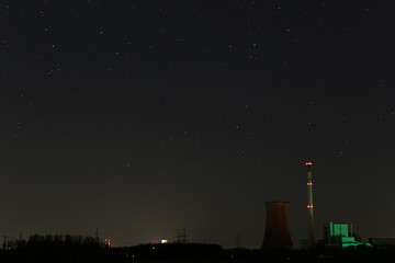 Power station at night with beatiful starry sky.