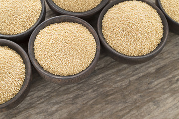 Organic amaranth seeds in wooden bowls - Amaranthus