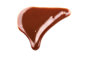 Chocolate syrup drips in shape of light bulb isolated on white
