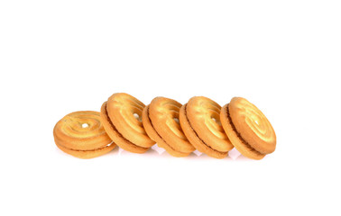 sandwich cookies with cream on white background