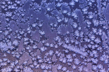 The window is covered with a crystal frosty pattern.