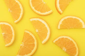 Orange slice isolated on orange background.