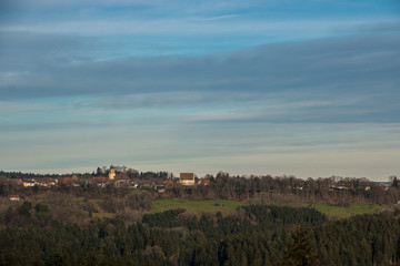 Obraz premium A village with fields, meadows and forerts