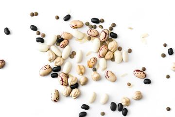 Assorted legumes isolated on white background. Top view