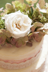Wedding cake with white rose flower detail
