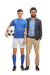 Teenage soccer player with his father