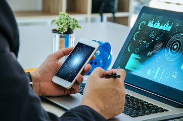 Double exposure hand with smart phone and city. world wide connection