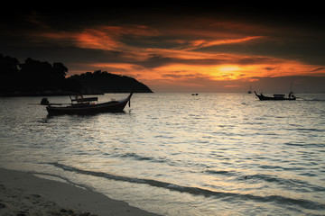 Silhouette boat during sunset at Lipe