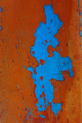 Natural abstract texture colored background with cracks and scratches. Old paint destroyed by water and time. Bright color surface.