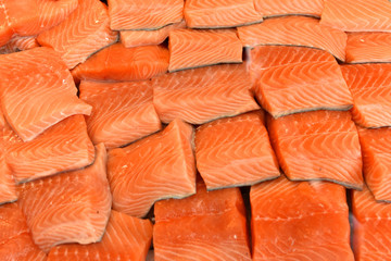 Fillet of salmon in the supermarket. Freshly frozen fish.
