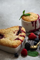 Mixed Berry Cobbler in heart shaped Ramekin / Valentines day dessert, selective focus