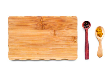 Cook a meal. Mock up for menu or recipe. Wooden cutting board near ingredients on white background top view