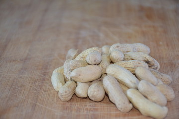 Peanut on wooden background