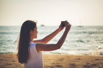 Woman selfie on beach