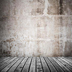 Old concrete wall and gray wooden floor