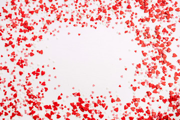 Valentine's Day background. Frame of red, pink and white hearts. Flat lay, top view love concept.