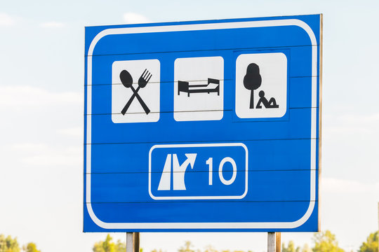 Dutch highway exit sign with tourist directions