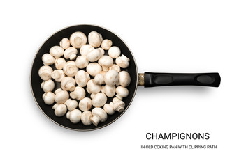 Whole Champignons in Old Pan Isolated