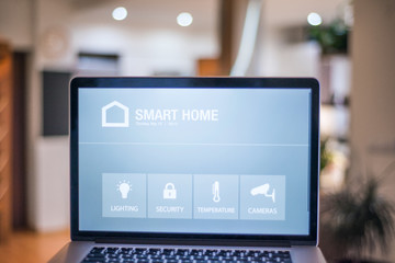 A laptop with smart home screen.