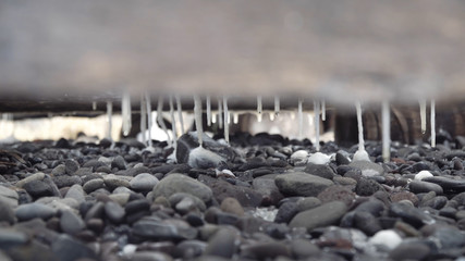 Production of sea salt in the Bali,Indonesia. Salt crystallizes out of the ground in salt farm,...