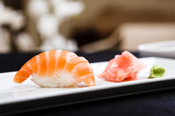 Salmon sushi served on a plate