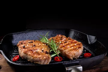 Grilled pork steak in grill pan © bondarillia