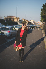 young beautiful red dressed vintage hipster woman