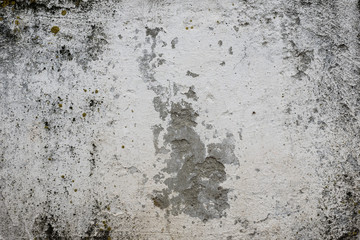 Wall fragment with scratches and cracks