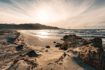 Waves washing onto Ostriconi beach in Balagne region of Corsica