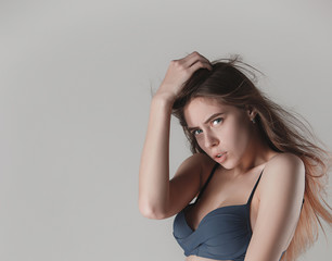 Fototapeta premium face of a beautiful young girl with a clean fresh face close up