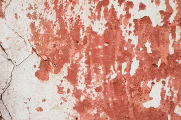 Wall fragment with scratches and cracks