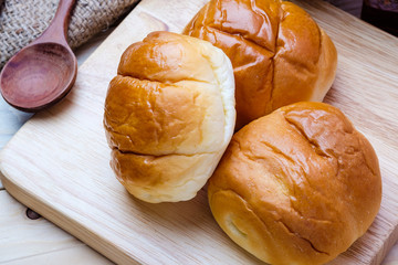Butter roll on wooden background
