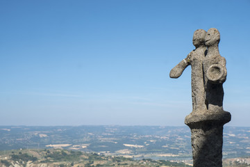 Panoramic view from Lugnano in Teverina (Umbria, Italy) and statue