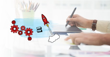 Hand using graphic tablet with graph overlays