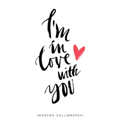 Fototapeta premium I am in love with you. Modern brush calligraphy. Handwritten ink lettering. Hand drawn design elements.