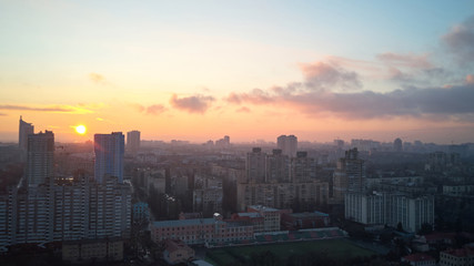 Fototapeta premium birdseye view of the city at sunrise