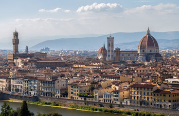 Fototapeta na wymiar FLORENCE (FIRENZE), JULY 28, 2017 - View of Santa Maria dei Fiori Church,the Dome (duomo) and Palazzo Vecchio from piazzale Michelangelo in Florence, (Firenze), Tuscany, Italy.