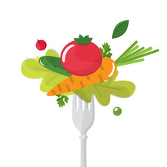 Vegetables sticked on fork. Healthy eating concept.